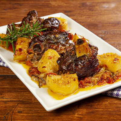 Agnello con patate al forno