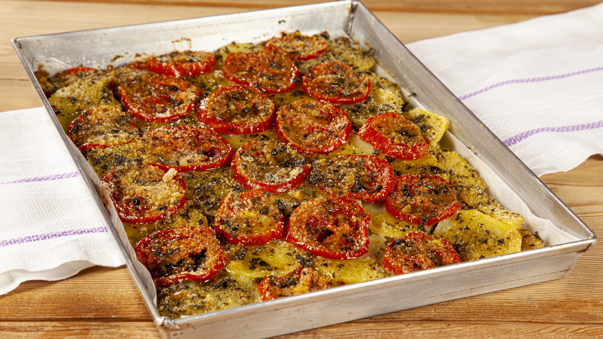 Patate e pomodori al forno