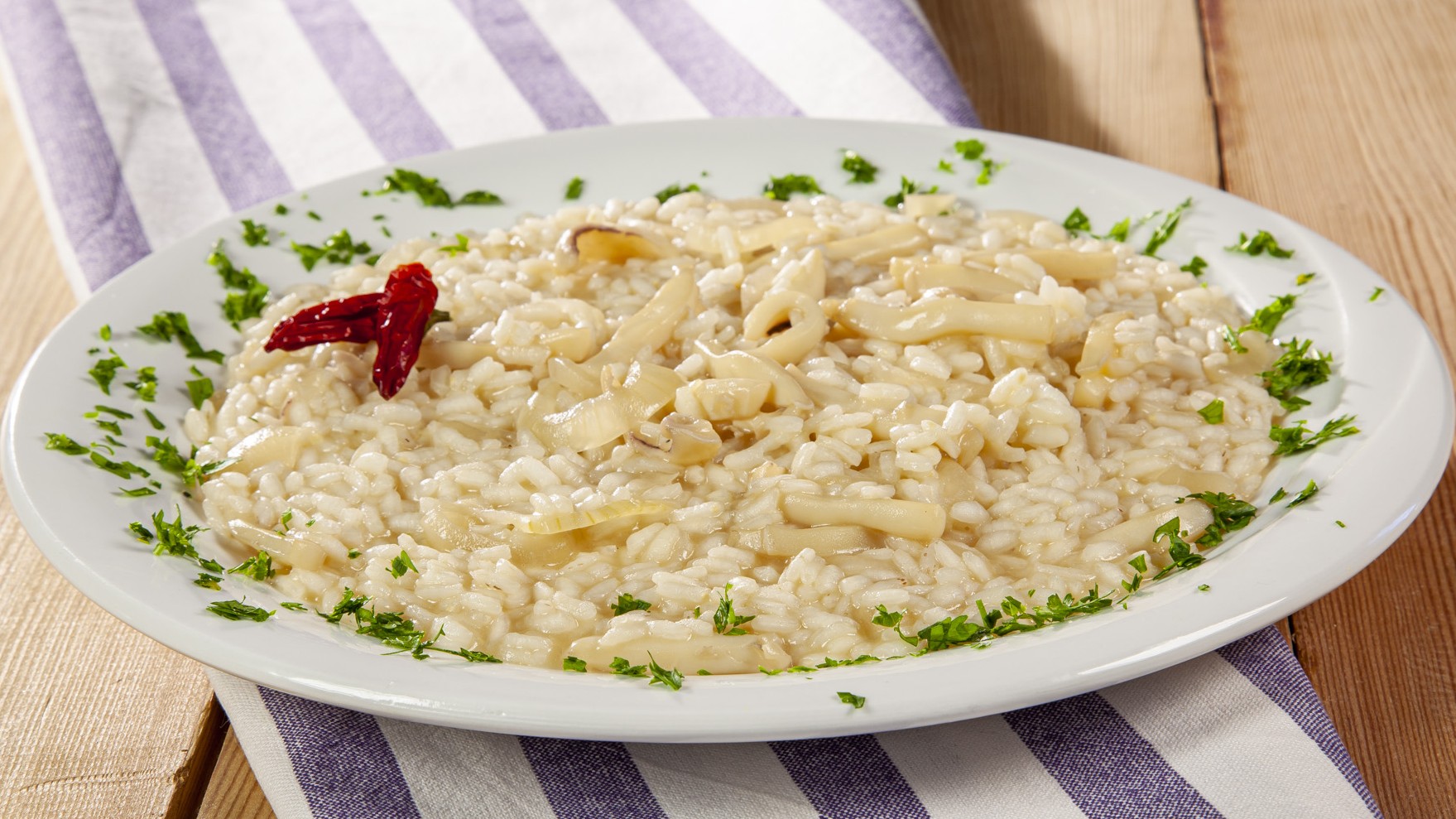 Risotto con le seppie all'uso di Mola Ricette Casa Pappagallo