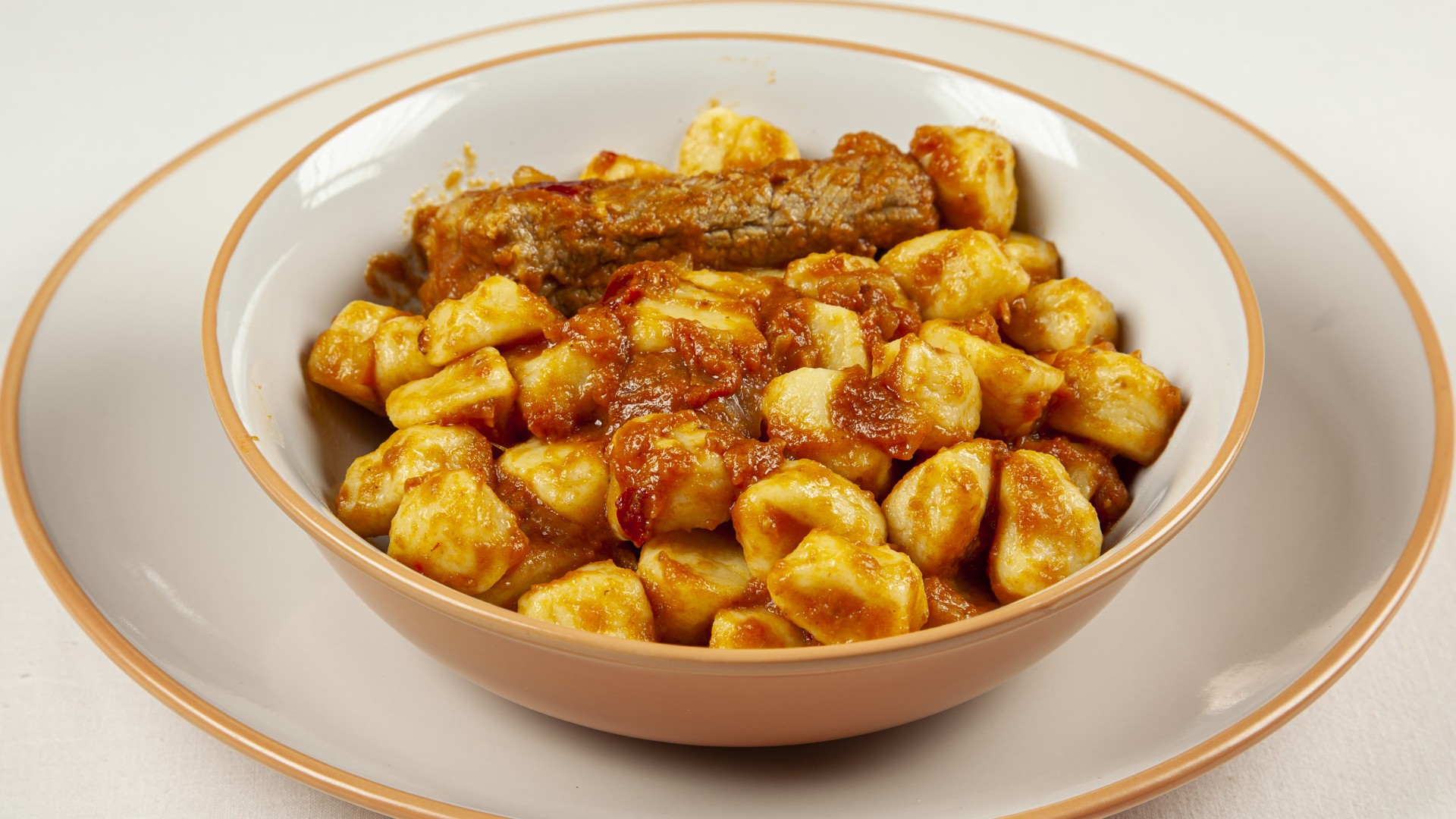 Gnocchi di patate con punte di maiale