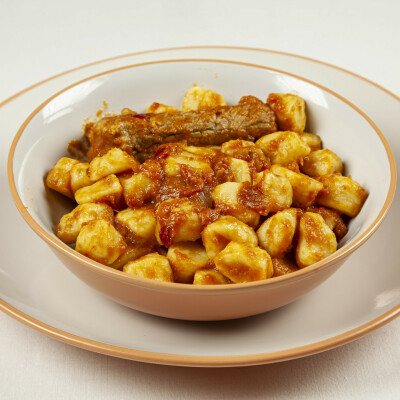 Gnocchi di patate con punte di maiale