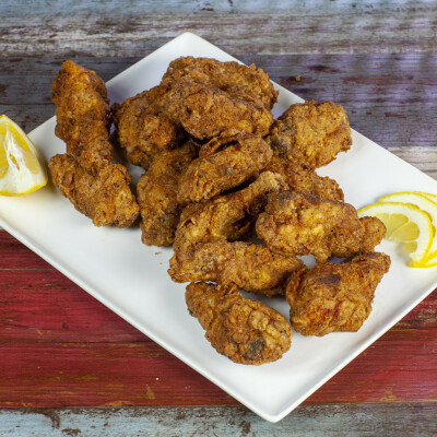 Alette di pollo fritte e al forno