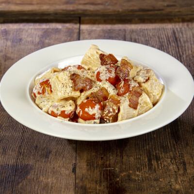 Pasta pomodorini ricotta e pancetta