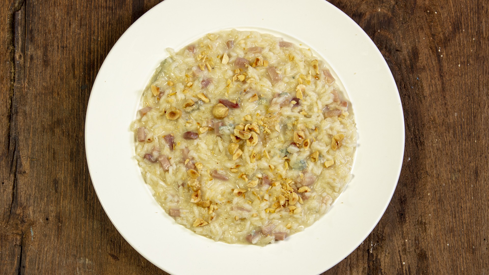 Risotto gorgonzola prosciutto cotto e nocciole