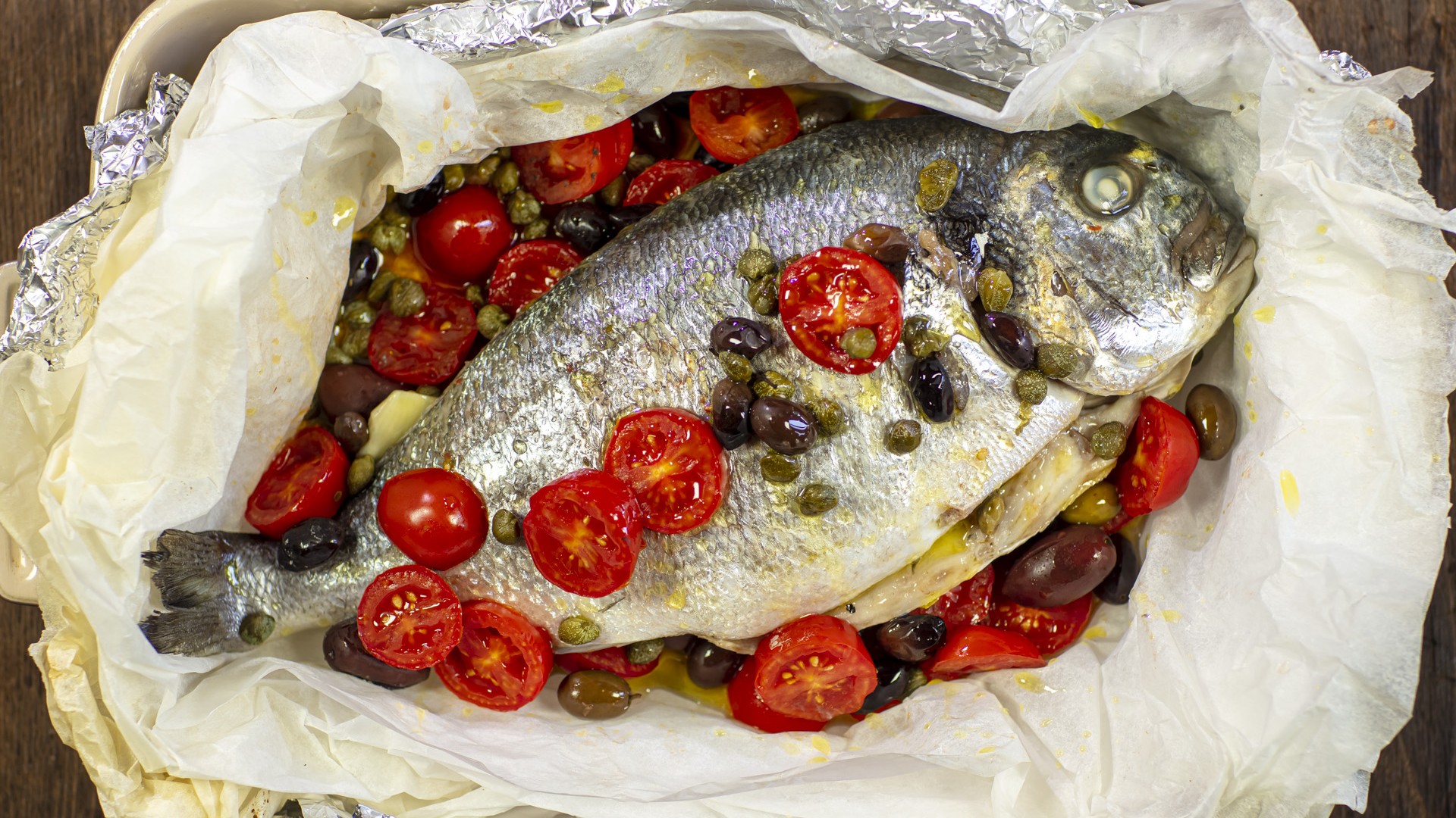 Orata al forno - Ricette Casa Pappagallo