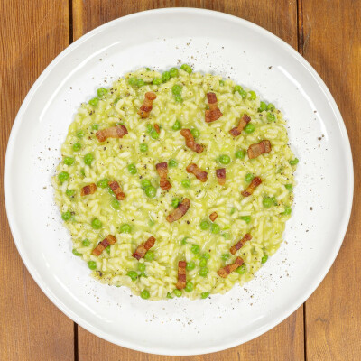 Risotto con piselli e pancetta