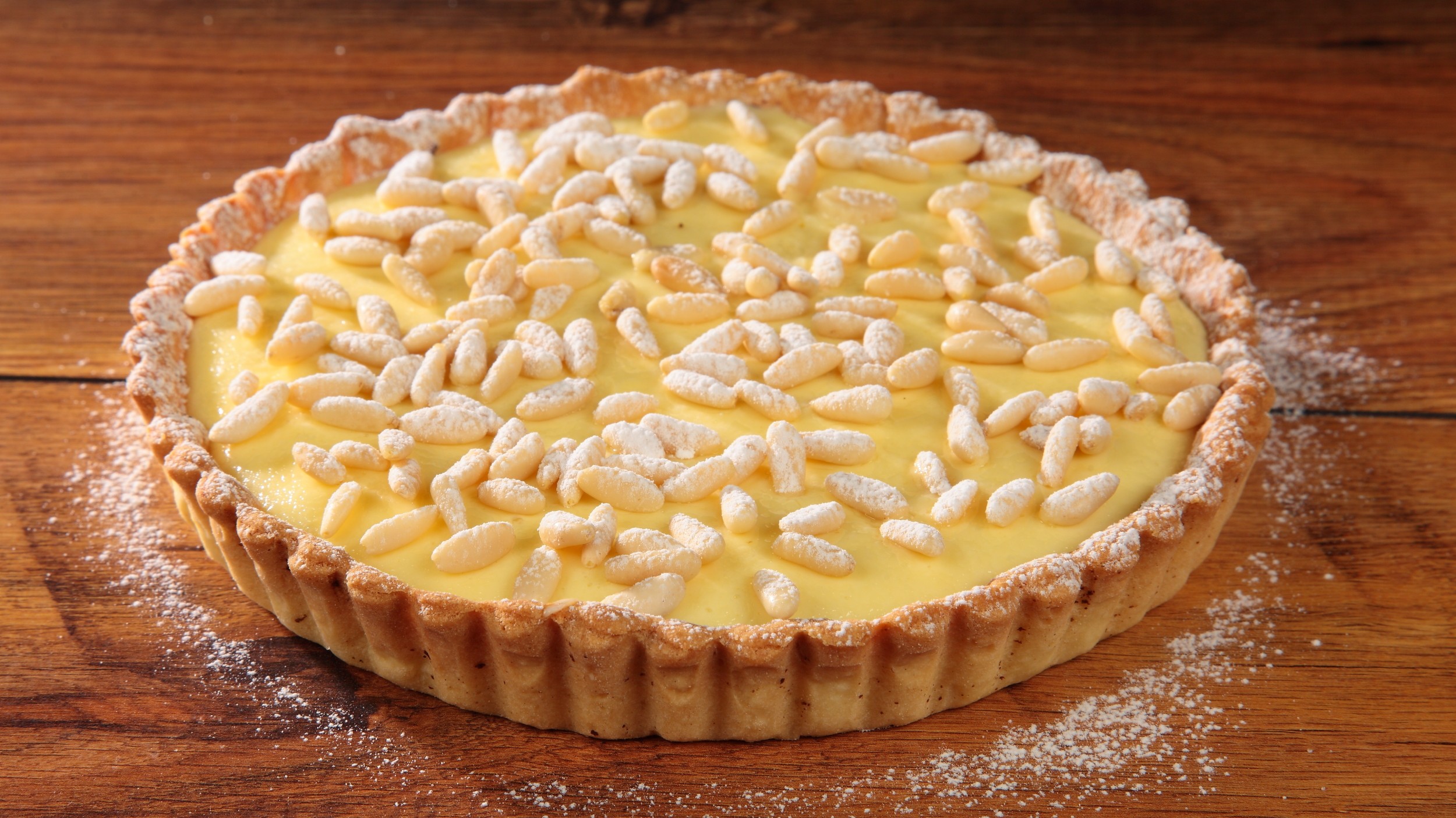 Crostata crema, pinoli e cioccolato